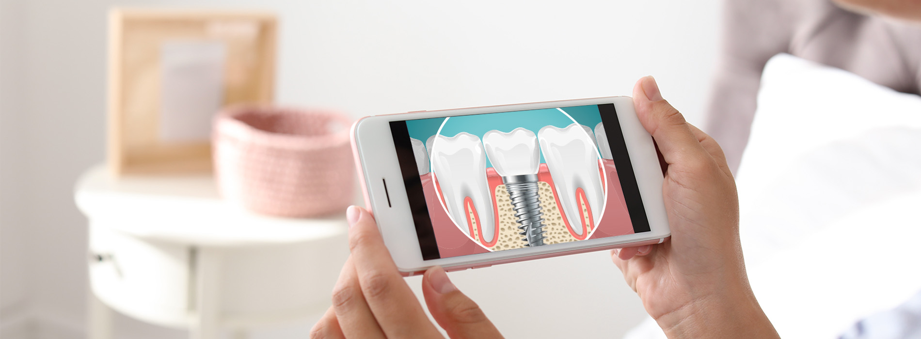 Person holding a smartphone displaying an image of a toothbrush with bristles.