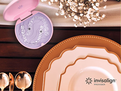 A promotional image showcasing a set of tableware, including plates and a serving tray, along with a cosmetic item, against a backdrop that suggests a dining setting.